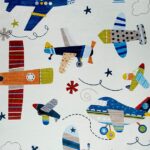 Colorful cartoon airplanes with stars and clouds.