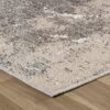 Close-up of textured gray and beige rug.