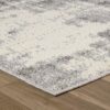 Gray and white textured area rug on floor