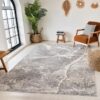 Modern living room with gray textured rug.