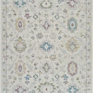 Vintage floral pattern rug in soft pastel colors.