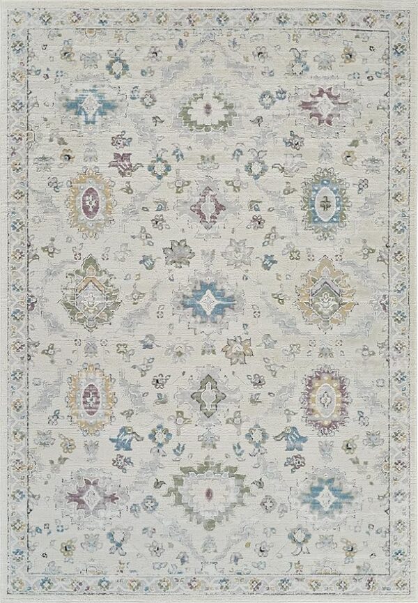 Vintage floral pattern rug in soft pastel colors.