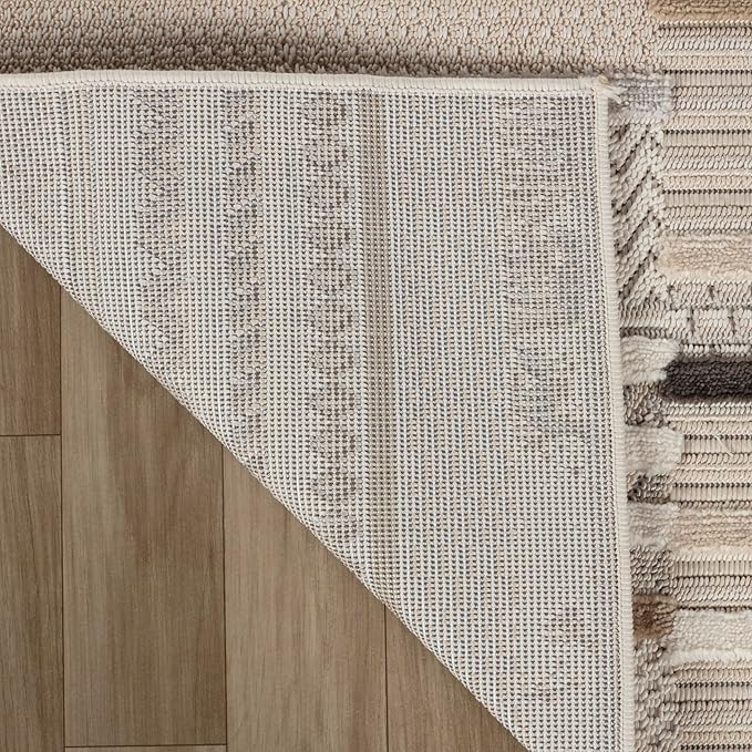Textured rug on wooden floor corner detail