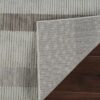 Striped rug on wooden floor