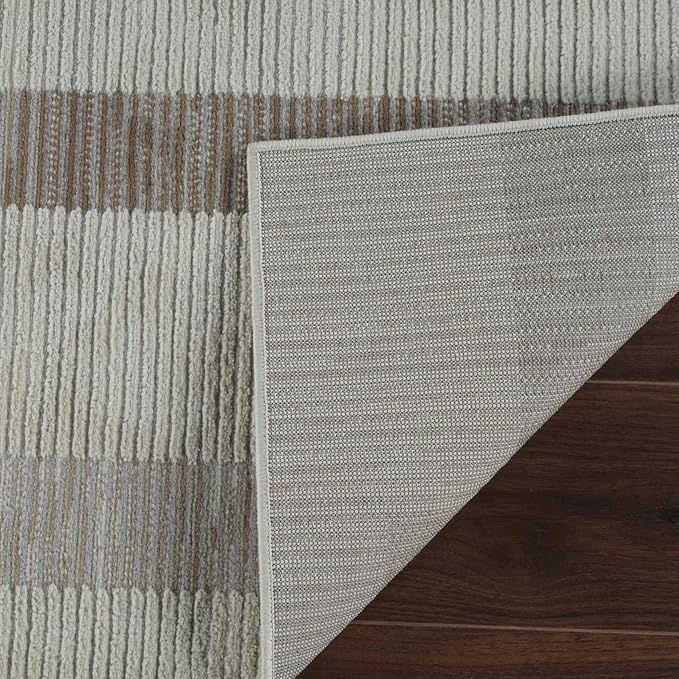 Striped rug on wooden floor