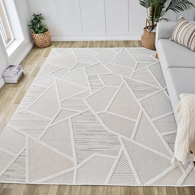Geometric-patterned rug in modern living room setting.
