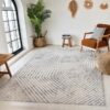 Modern living room with geometric patterned rug.