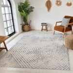 Modern living room with geometric patterned rug.