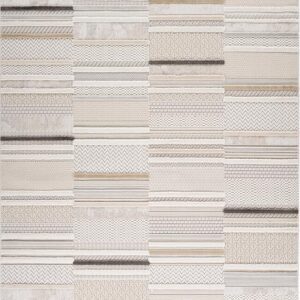 Intricate beige and white textured tile pattern.