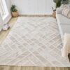 Modern geometric area rug in a living room.