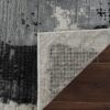 Rug corner flipped showing pattern and texture