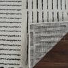 Black and white rug with corner flipped