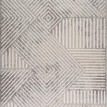 Geometric pattern rug with gray and white stripes.