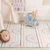 Kids' room with toy cart and animal decor