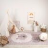 Children's room with toys and cozy decor.