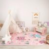 Children's room with tent and pink rug