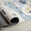 Children's rug with roads and vehicles design.