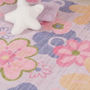 Colorful floral pattern rug with star pillow