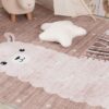 Nursery rug with sheep and star pillow.