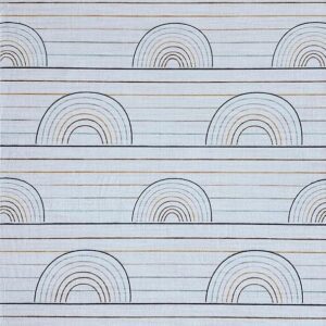 Patterned fabric with rainbow arcs and lines