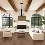 Cozy living room with fireplace and large windows.