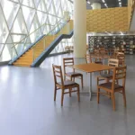 Modern library with tables and bookshelves