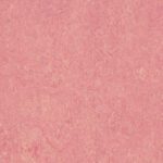 Pink textured background pattern.