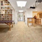 Modern library with bookshelves and carpet flooring.