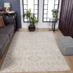 Modern living room with geometric patterned rug.