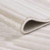 Gray striped rolled rug close-up.