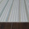 Striped rug on wood floor