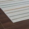 Striped rug on wooden floor