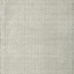 Close-up of a textured white and black area rug