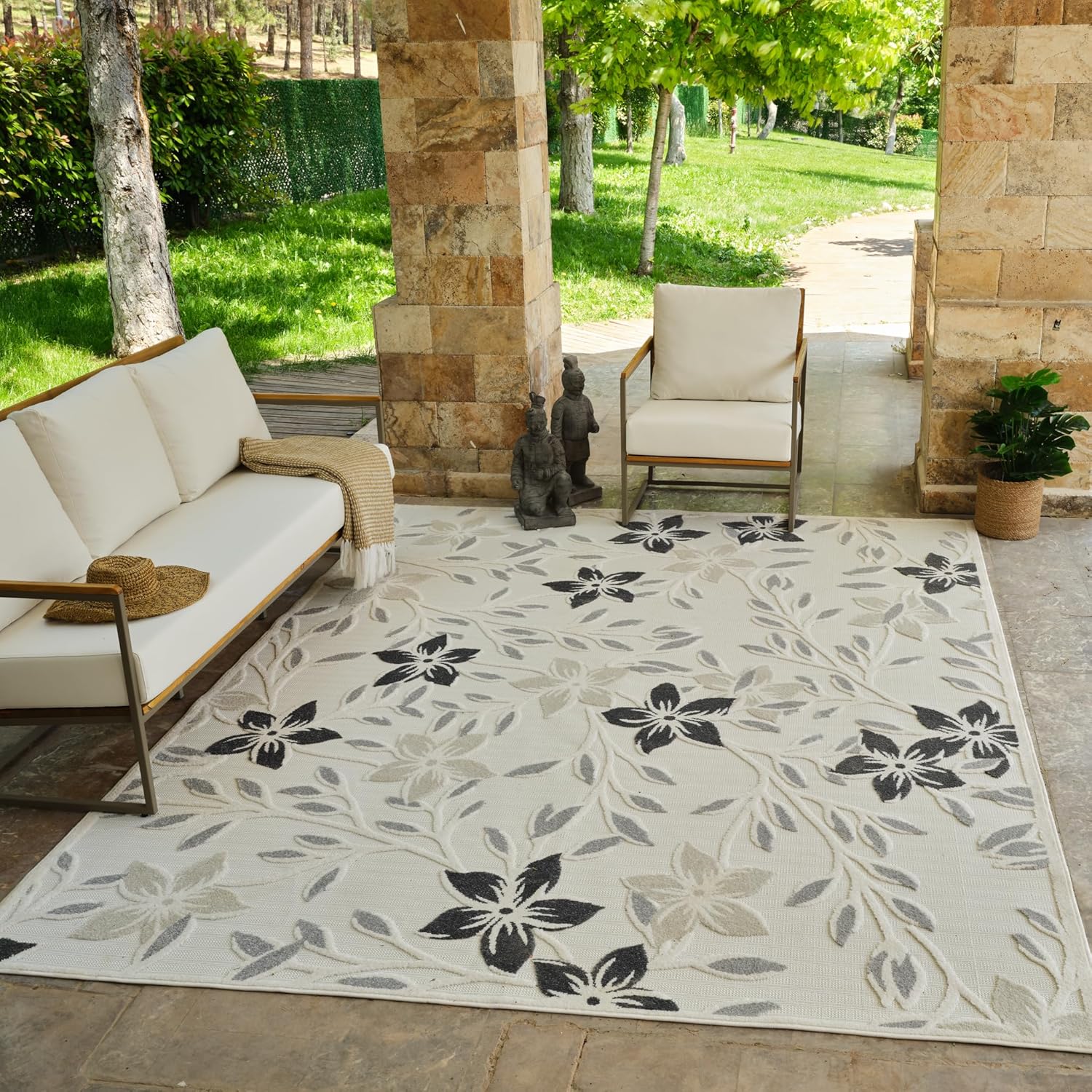 Outdoor patio with floral patterned rug