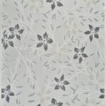 Intricate floral pattern with leaves and blossoms.