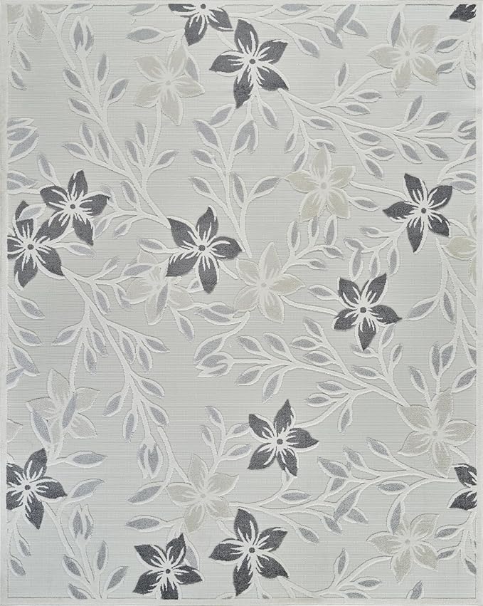 Intricate floral pattern with leaves and blossoms.