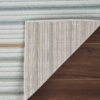 Striped rug on wooden floor