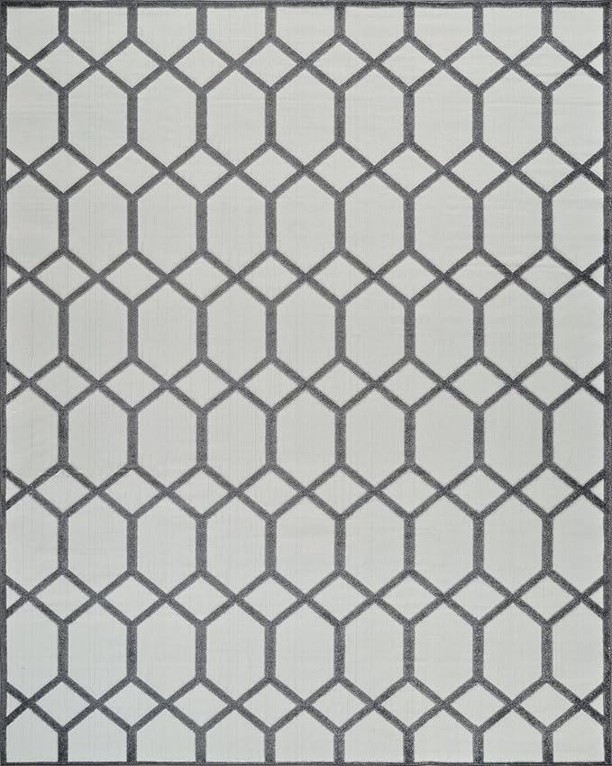 Gray geometric pattern rug with diamond shapes.