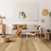 Modern living room with plants and cozy decor.