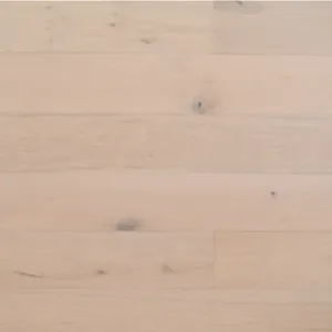 Light hardwood flooring with visible knots