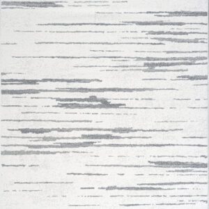 Gray and white abstract patterned rug