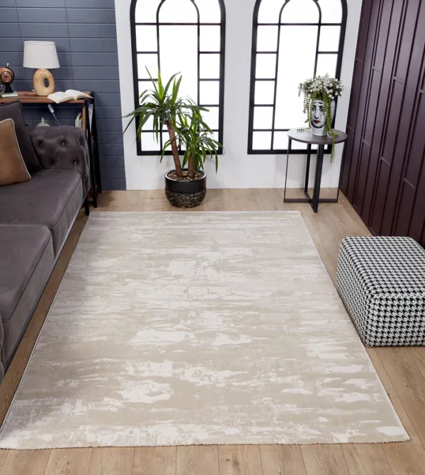 Modern living room with large beige rug.