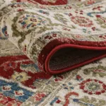 Detailed close-up of a colorful Persian rug.