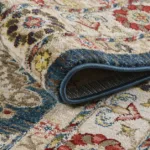 Close-up of rolled colorful patterned rug