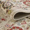 Close-up of rolled floral-patterned rug