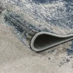 Close-up of a blue patterned rug corner