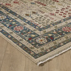 Colorful patterned area rug on wooden floor