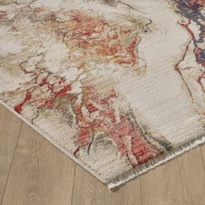 Abstract area rug on wooden floor