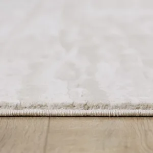 Close-up of a white carpet edge.