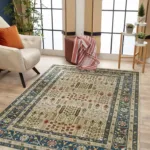 Living room with patterned rug and armchair.